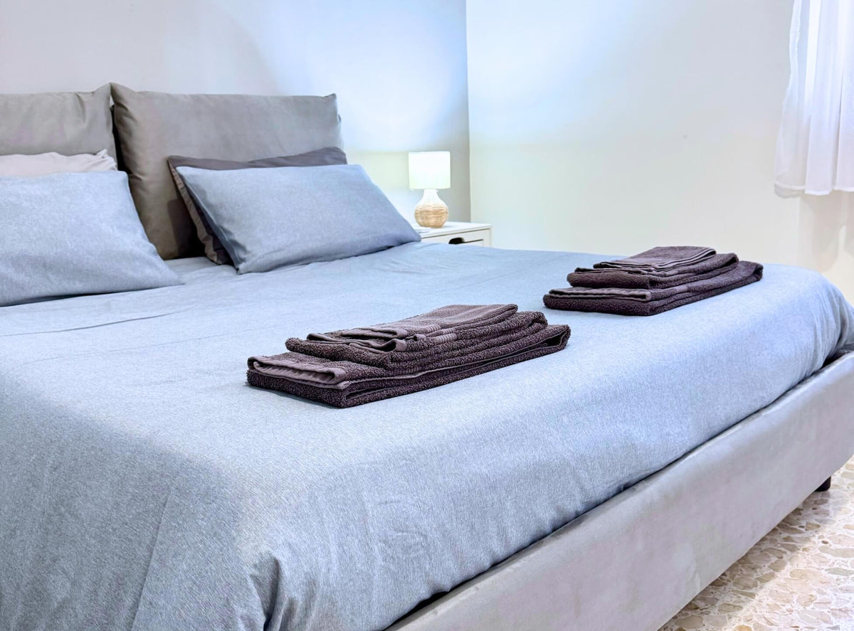 Camera da letto moderna dell'appartamento per soggiornare a Roma Adelaide's House